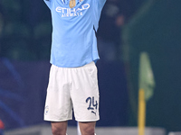 Josko Gvardiol of Manchester City reacts after Viktor Gyokeres of Sporting CP scores his team's fourth goal during the UEFA Champions League...