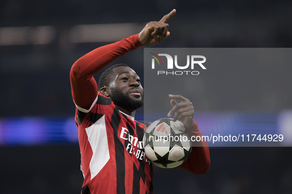 Youssouf Fofana of AC Milan celebrates victory during the UEFA Champions League 2024/25 match between Real Madrid and AC Milan at Santiago B...