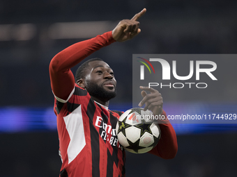 Youssouf Fofana of AC Milan celebrates victory during the UEFA Champions League 2024/25 match between Real Madrid and AC Milan at Santiago B...