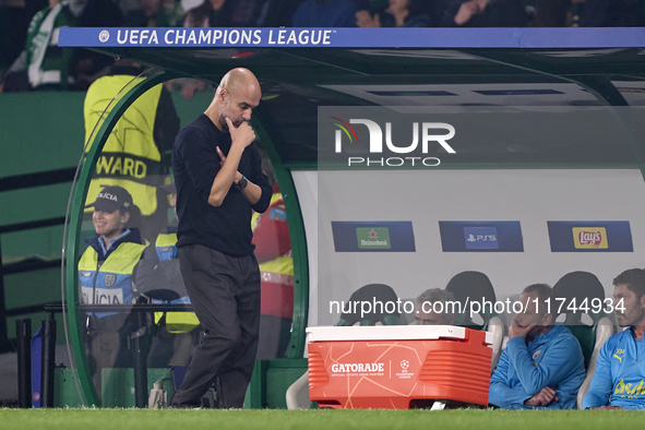 Pep Guardiola, Head Coach of Manchester City, reacts after Viktor Gyokeres of Sporting CP (not in frame) scores his team's fourth goal durin...