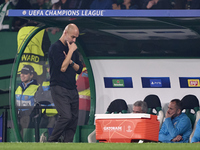 Pep Guardiola, Head Coach of Manchester City, reacts after Viktor Gyokeres of Sporting CP (not in frame) scores his team's fourth goal durin...