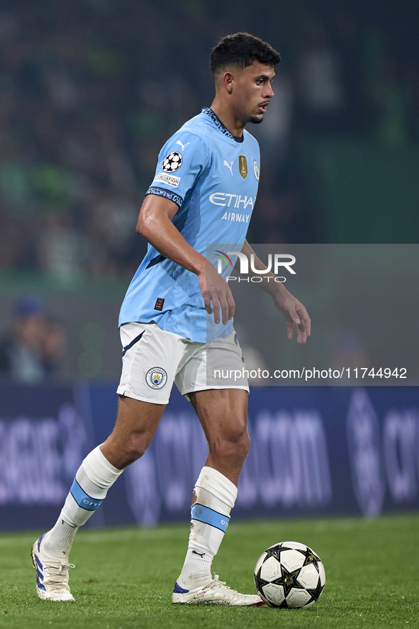 Matheus Nunes of Manchester City is in action during the UEFA Champions League match between Sporting CP and Manchester City at Jose Alvalad...