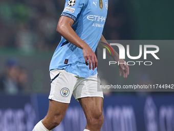 Matheus Nunes of Manchester City is in action during the UEFA Champions League match between Sporting CP and Manchester City at Jose Alvalad...