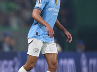 Matheus Nunes of Manchester City is in action during the UEFA Champions League match between Sporting CP and Manchester City at Jose Alvalad...