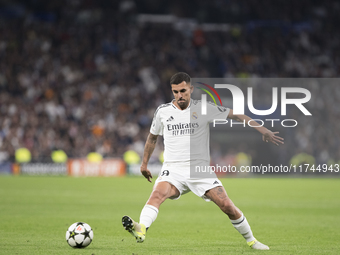 Dani Ceballos of Real Madrid is in action during the UEFA Champions League 2024/25 match between Real Madrid and AC Milan at Santiago Bernab...