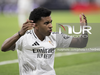 Rodrygo Goes of Real Madrid reacts to a missed opportunity during the UEFA Champions League 2024/25 match between Real Madrid and AC Milan a...