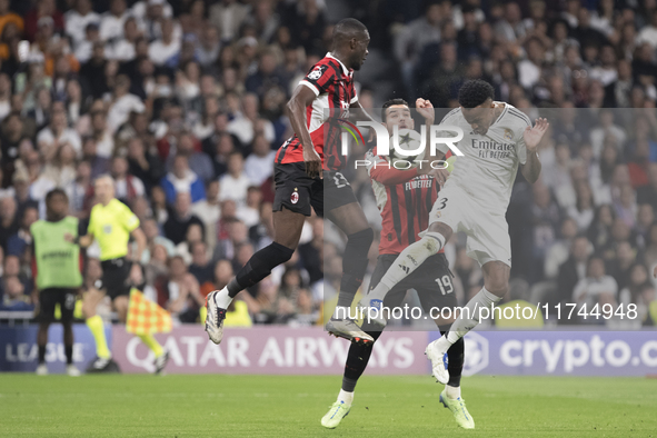 Eder Militao of Real Madrid attempts a header during the UEFA Champions League 2024/25 match between Real Madrid and AC Milan at Santiago Be...