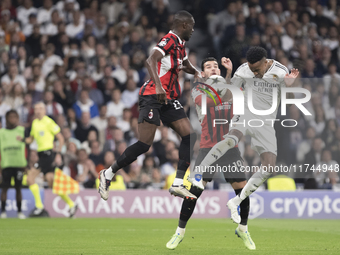 Eder Militao of Real Madrid attempts a header during the UEFA Champions League 2024/25 match between Real Madrid and AC Milan at Santiago Be...