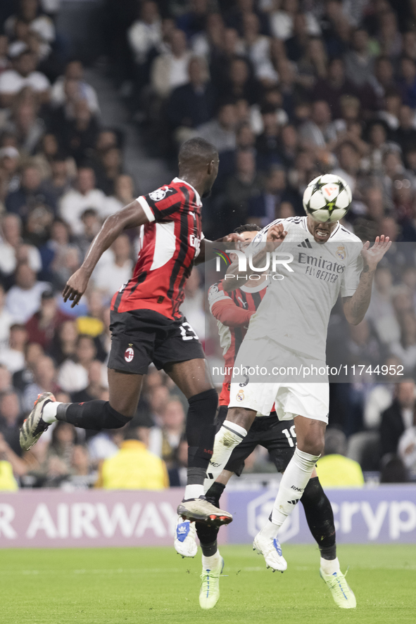 Eder Militao of Real Madrid attempts a header during the UEFA Champions League 2024/25 match between Real Madrid and AC Milan at Santiago Be...