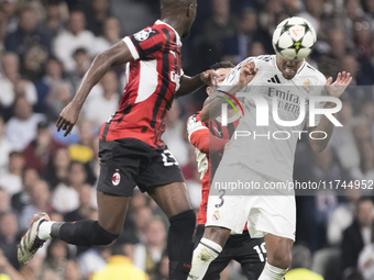 Eder Militao of Real Madrid attempts a header during the UEFA Champions League 2024/25 match between Real Madrid and AC Milan at Santiago Be...