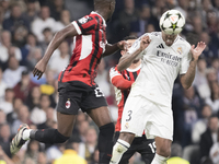 Eder Militao of Real Madrid attempts a header during the UEFA Champions League 2024/25 match between Real Madrid and AC Milan at Santiago Be...