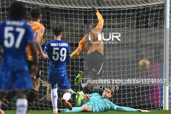 Goalkeeper Lucas Bergstrom (47 Chelsea) saves from Brandon Njoku (34 Cambridge United) during the EFL Trophy match between Cambridge United...