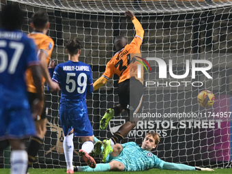 Goalkeeper Lucas Bergstrom (47 Chelsea) saves from Brandon Njoku (34 Cambridge United) during the EFL Trophy match between Cambridge United...