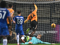 Goalkeeper Lucas Bergstrom (47 Chelsea) saves from Brandon Njoku (34 Cambridge United) during the EFL Trophy match between Cambridge United...