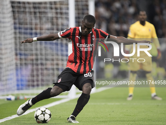 Yunus Musah of AC Milan is in action during the UEFA Champions League 2024/25 match between Real Madrid and AC Milan at Santiago Bernabeu St...