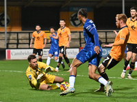 Goalkeeper Jack Stevens (1, Cambridge United) saves from Ishe Samuels Smith (62, Chelsea) during the EFL Trophy match between Cambridge Unit...