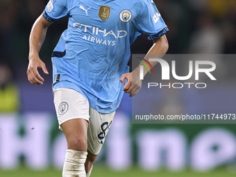 Rico Lewis of Manchester City is in action during the UEFA Champions League match between Sporting CP and Manchester City at Jose Alvalade S...