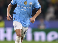 Rico Lewis of Manchester City is in action during the UEFA Champions League match between Sporting CP and Manchester City at Jose Alvalade S...