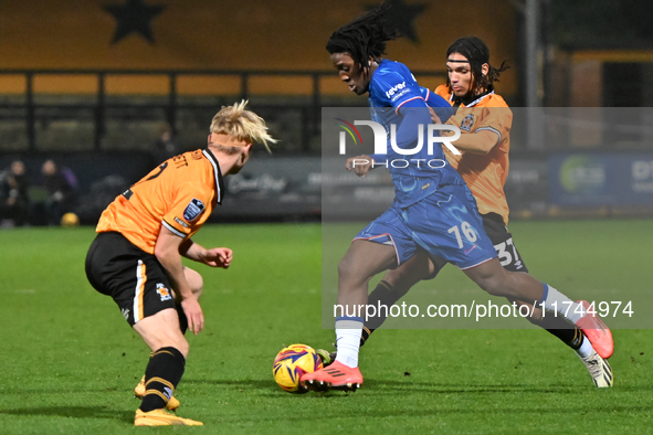 Shumaira Mheuka (76 Chelsea) challenges Amaru Kaunda (37 Cambridge United) during the EFL Trophy match between Cambridge United and Chelsea...