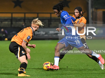 Shumaira Mheuka (76 Chelsea) challenges Amaru Kaunda (37 Cambridge United) during the EFL Trophy match between Cambridge United and Chelsea...