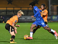 Shumaira Mheuka (76 Chelsea) challenges Amaru Kaunda (37 Cambridge United) during the EFL Trophy match between Cambridge United and Chelsea...