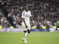 Vinicius Jr of Real Madrid reacts to a missed opportunity during the UEFA Champions League 2024/25 match between Real Madrid and AC Milan at...