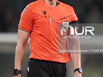 Referee Daniel Siebert reacts during the UEFA Champions League match between Sporting CP and Manchester City at Jose Alvalade Stadium in Lis...