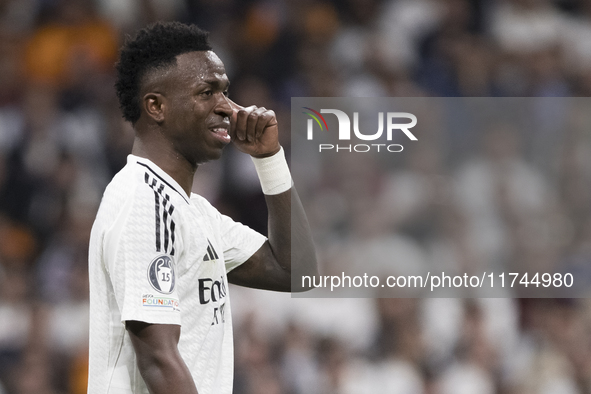 Vinicius Jr of Real Madrid makes the gesture of being crazy to the referee during the UEFA Champions League 2024/25 match between Real Madri...