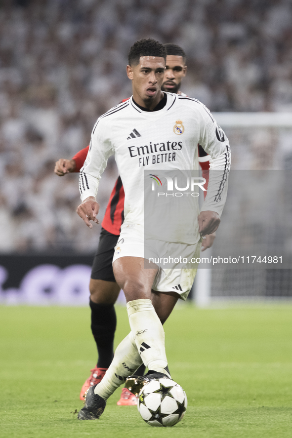 Jude Bellingham of Real Madrid is in action during the UEFA Champions League 2024/25 match between Real Madrid and AC Milan at Santiago Bern...