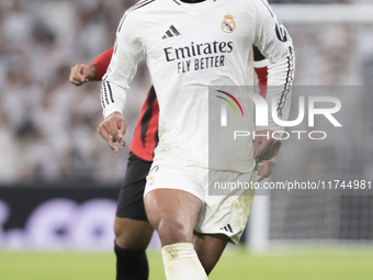 Jude Bellingham of Real Madrid is in action during the UEFA Champions League 2024/25 match between Real Madrid and AC Milan at Santiago Bern...