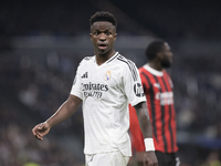 Vinicius Jr of Real Madrid plays during the UEFA Champions League 2024/25 match between Real Madrid and AC Milan at Santiago Bernabeu Stadiu...