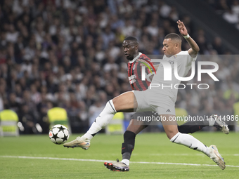 In Madrid, Spain, on November 5, Kylian Mbappe of Real Madrid attempts a shot during the UEFA Champions League 2024/25 match between Real Ma...