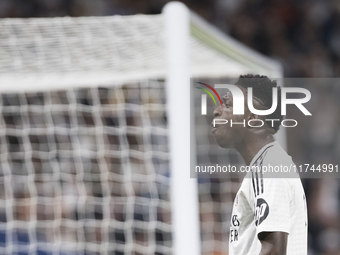 Vinicius Jr of Real Madrid reacts to a missed opportunity during the UEFA Champions League 2024/25 match between Real Madrid and AC Milan at...