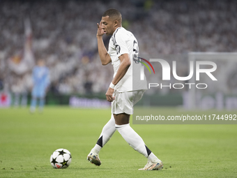 Kylian Mbappe of Real Madrid controls the ball during the UEFA Champions League 2024/25 match between Real Madrid and AC Milan at Santiago B...