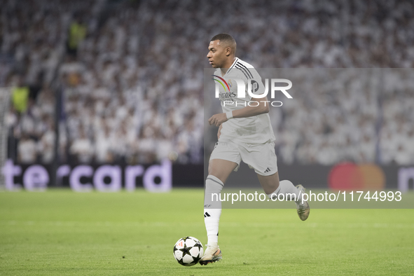 Kylian Mbappe of Real Madrid is in action during the UEFA Champions League 2024/25 match between Real Madrid and AC Milan at Santiago Bernab...