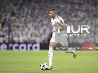 Kylian Mbappe of Real Madrid is in action during the UEFA Champions League 2024/25 match between Real Madrid and AC Milan at Santiago Bernab...