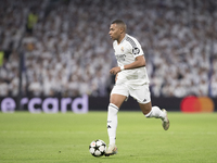 Kylian Mbappe of Real Madrid is in action during the UEFA Champions League 2024/25 match between Real Madrid and AC Milan at Santiago Bernab...