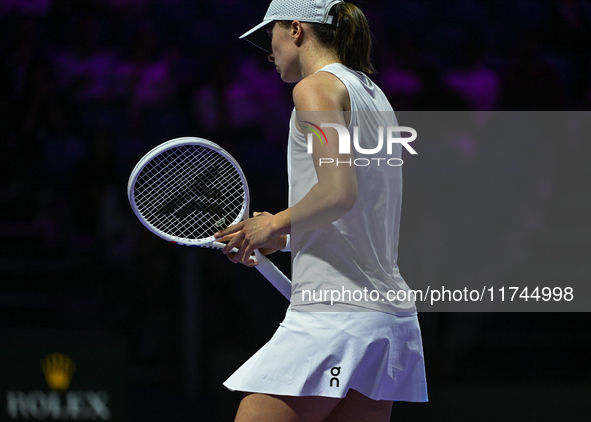 RIYADH, SAUDI ARABIA - NOVEMBER 05: Iga Swiatek of Poland during her match against Coco Gauff of USA, on day 4 of the 2024 WTA Finals, part...