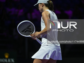 RIYADH, SAUDI ARABIA - NOVEMBER 05: Iga Swiatek of Poland during her match against Coco Gauff of USA, on day 4 of the 2024 WTA Finals, part...