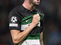 Zeno Debast of Sporting CP celebrates victory after the UEFA Champions League match between Sporting CP and Manchester City at Jose Alvalade...