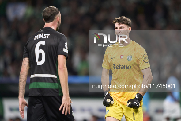 Franco Israel of Sporting CP celebrates victory with Zeno Debast after the UEFA Champions League match between Sporting CP and Manchester Ci...