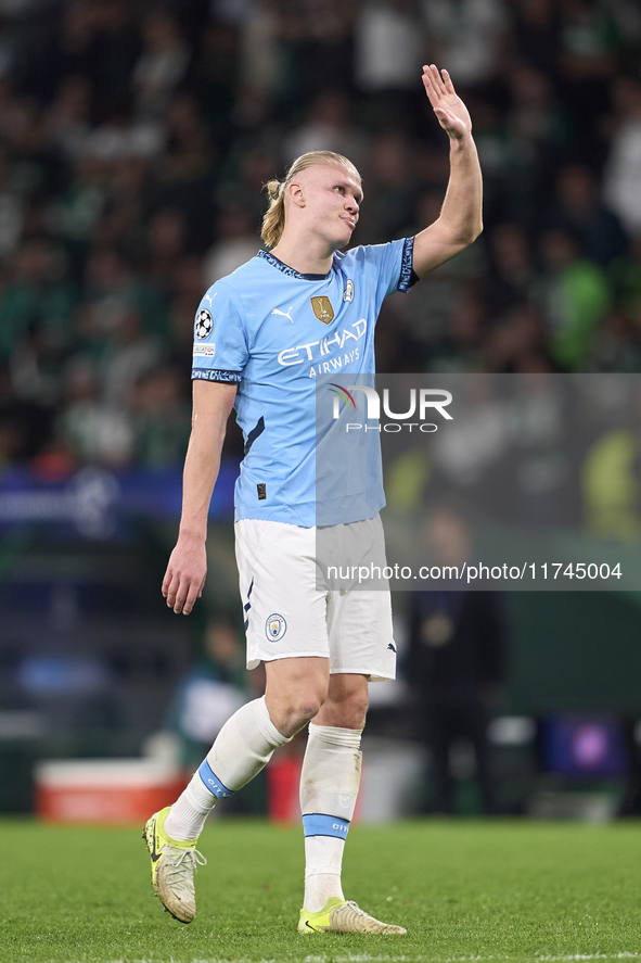 Erling Haaland of Manchester City shows appreciation to the fans after the UEFA Champions League match between Sporting CP and Manchester Ci...