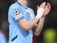 Phil Foden of Manchester City shows appreciation to the fans after the UEFA Champions League match between Sporting CP and Manchester City a...