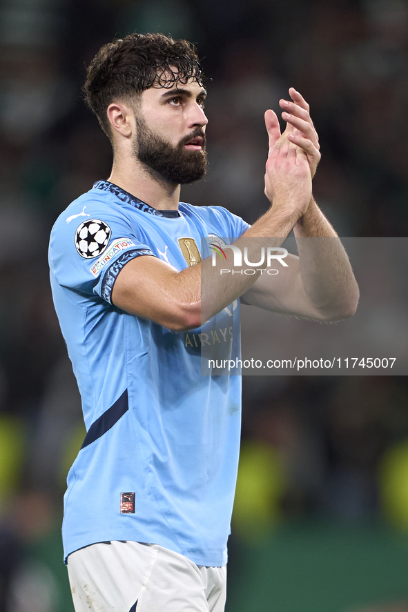 Josko Gvardiol of Manchester City shows appreciation to the fans after the UEFA Champions League match between Sporting CP and Manchester Ci...