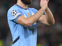 Josko Gvardiol of Manchester City shows appreciation to the fans after the UEFA Champions League match between Sporting CP and Manchester Ci...