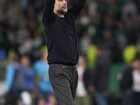 Pep Guardiola, Head Coach of Manchester City, shows appreciation to the fans after the UEFA Champions League match between Sporting CP and M...