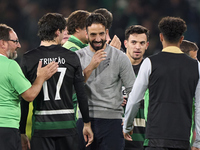 Ruben Amorim, Head Coach of Sporting CP, celebrates victory with his players after the UEFA Champions League match between Sporting CP and M...