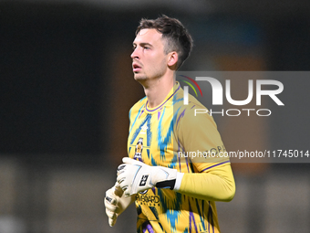 Goalkeeper Jack Stevens of Cambridge United plays during the EFL Trophy match between Cambridge United and Chelsea Under 21s at the Cledara...