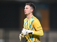 Goalkeeper Jack Stevens of Cambridge United plays during the EFL Trophy match between Cambridge United and Chelsea Under 21s at the Cledara...