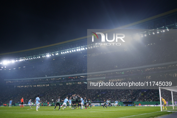 Phil Foden of Manchester City takes a shot during the UEFA Champions League match between Sporting CP and Manchester City at Jose Alvalade S...